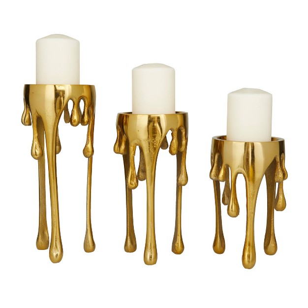 Aluminum Abstract Pillar Drip Set Of 3 Gold Candle Holder Cosmoliving By Cosmopolitan