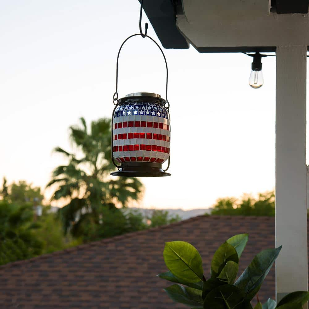 Alpine Corporation 7 in. Tall Hanging Solar Powered Outdoor Patriotic Lantern with LED Lights SLL2224SLR