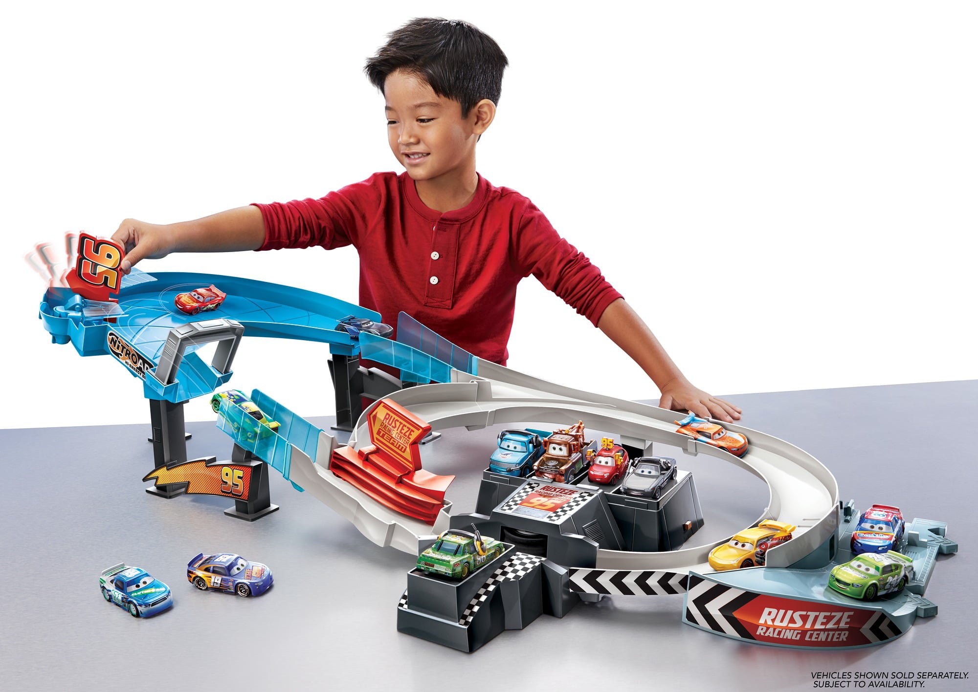 Disney and Pixar Cars Rusteze Double Circuit Speedway Playset with Lightning McQueen Toy Car