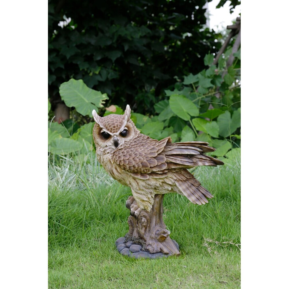 Large Long Eared Owl On Stump With Fluffed Feathers