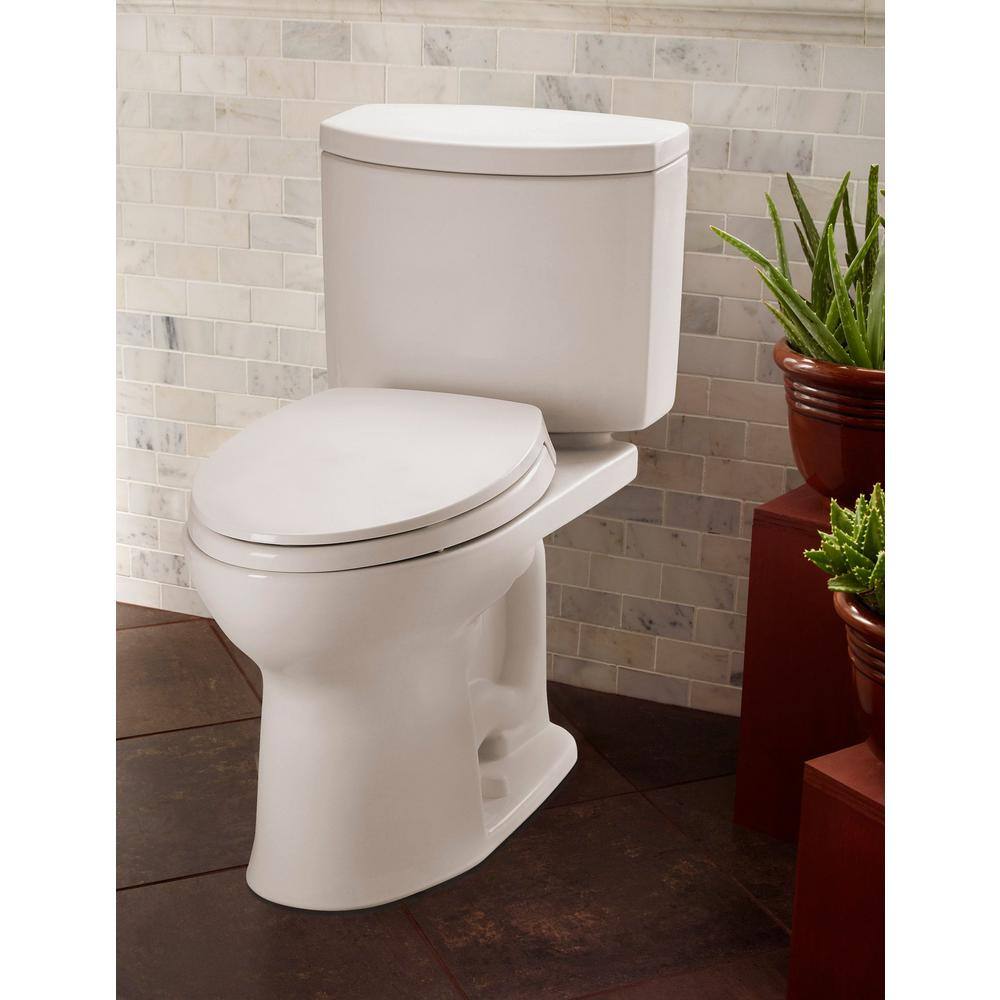 TOTO Drake II 2-Piece 1 GPF Single Flush Elongated ADA Comfort Height Toilet in Cotton White SoftClose Seat Included MS453124CUFG#01