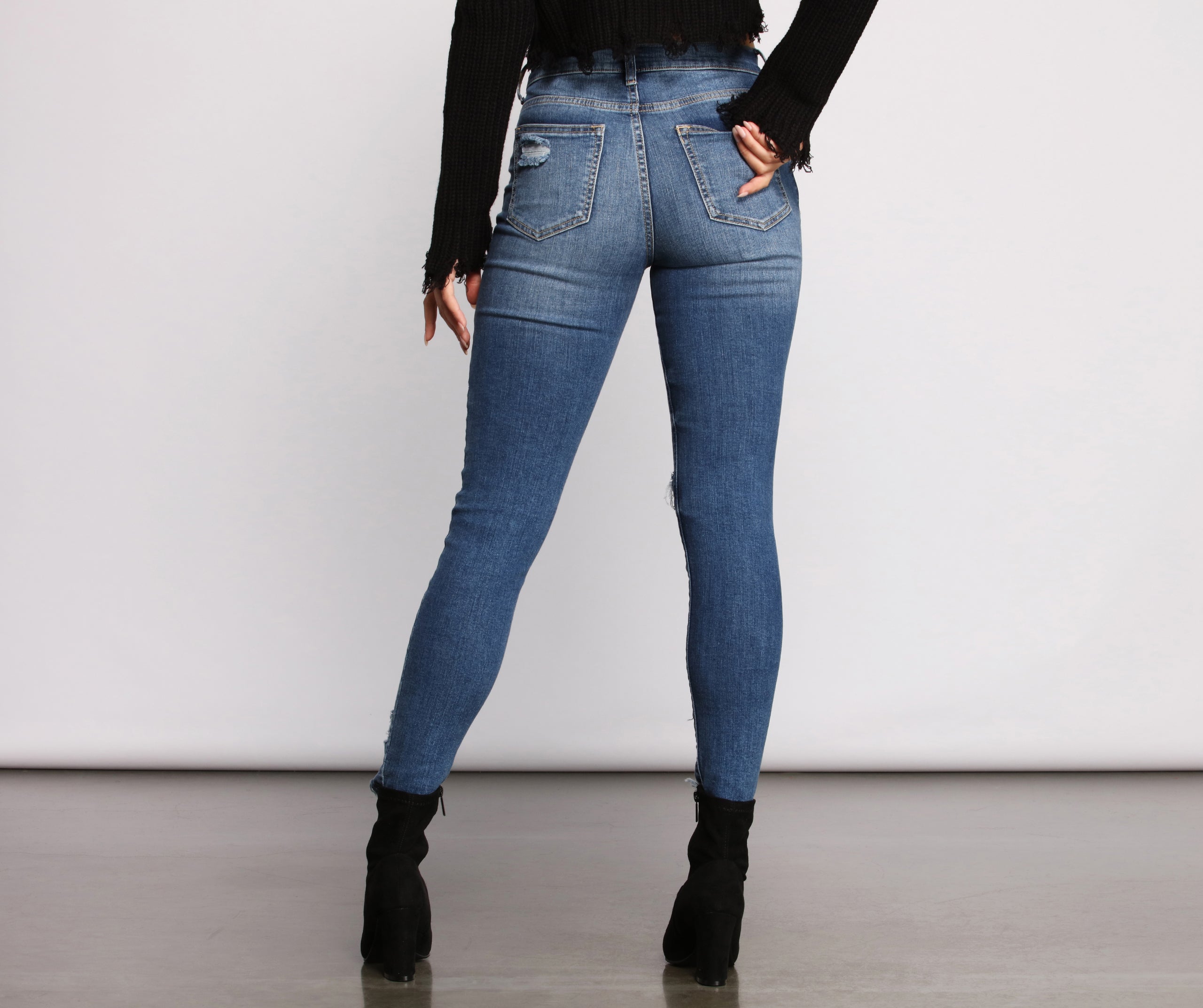 Mid-Rise Destructed Skinny Jeans