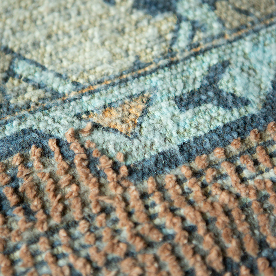 Square printed over tufted rug