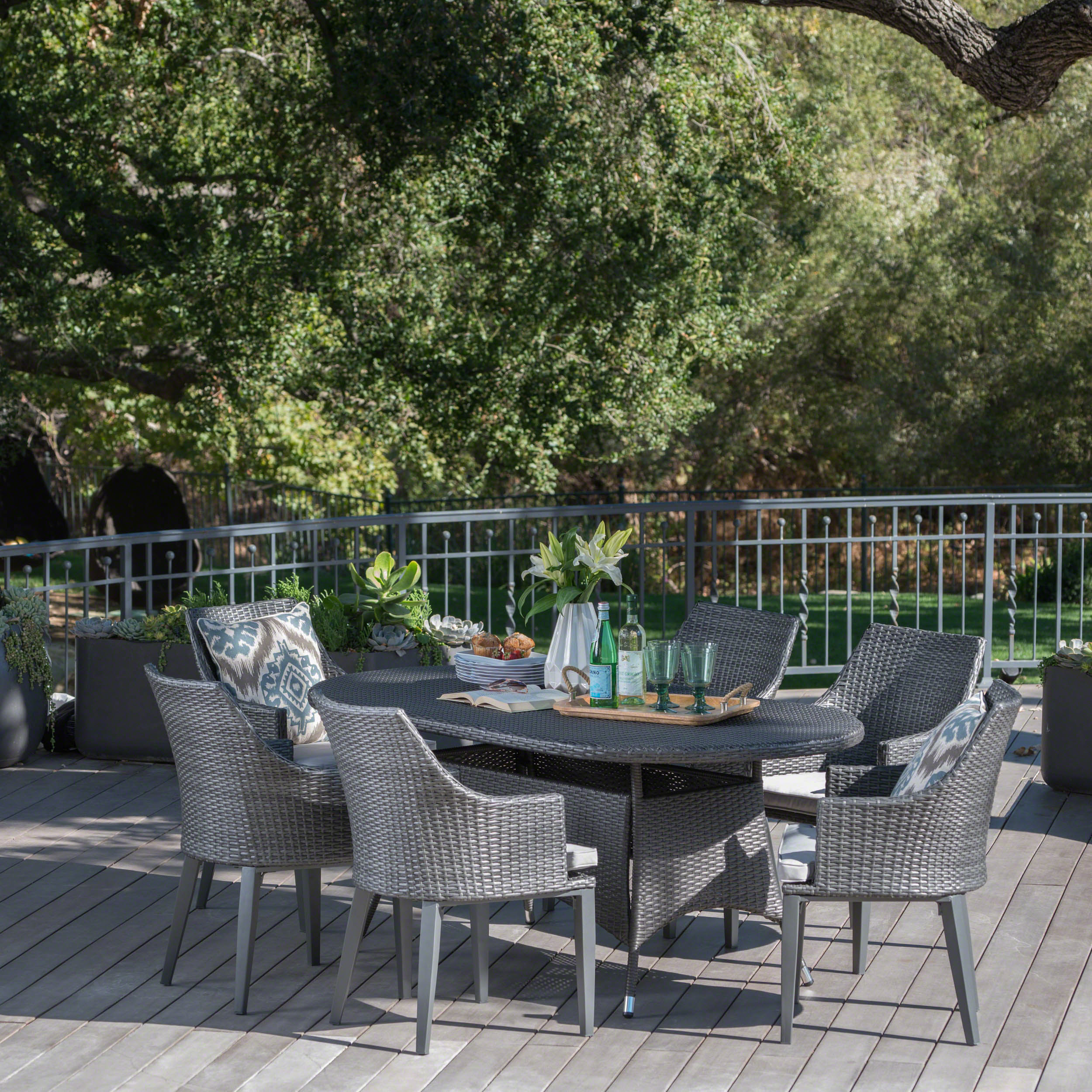 Leeward Outdoor 7 Piece Wicker Oval Dining Set