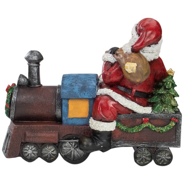 Red And Blue Santa On A Train Christmas Tabletop Decoration