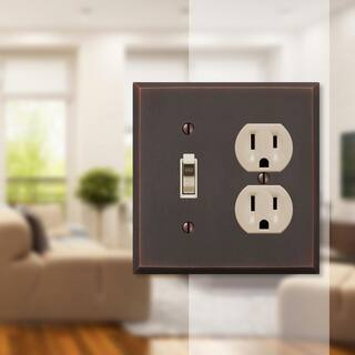 AMERELLE Manhattan 2 Gang 1-Toggle and 1-Duplex Metal Wall Plate - Aged Bronze 68TDDB