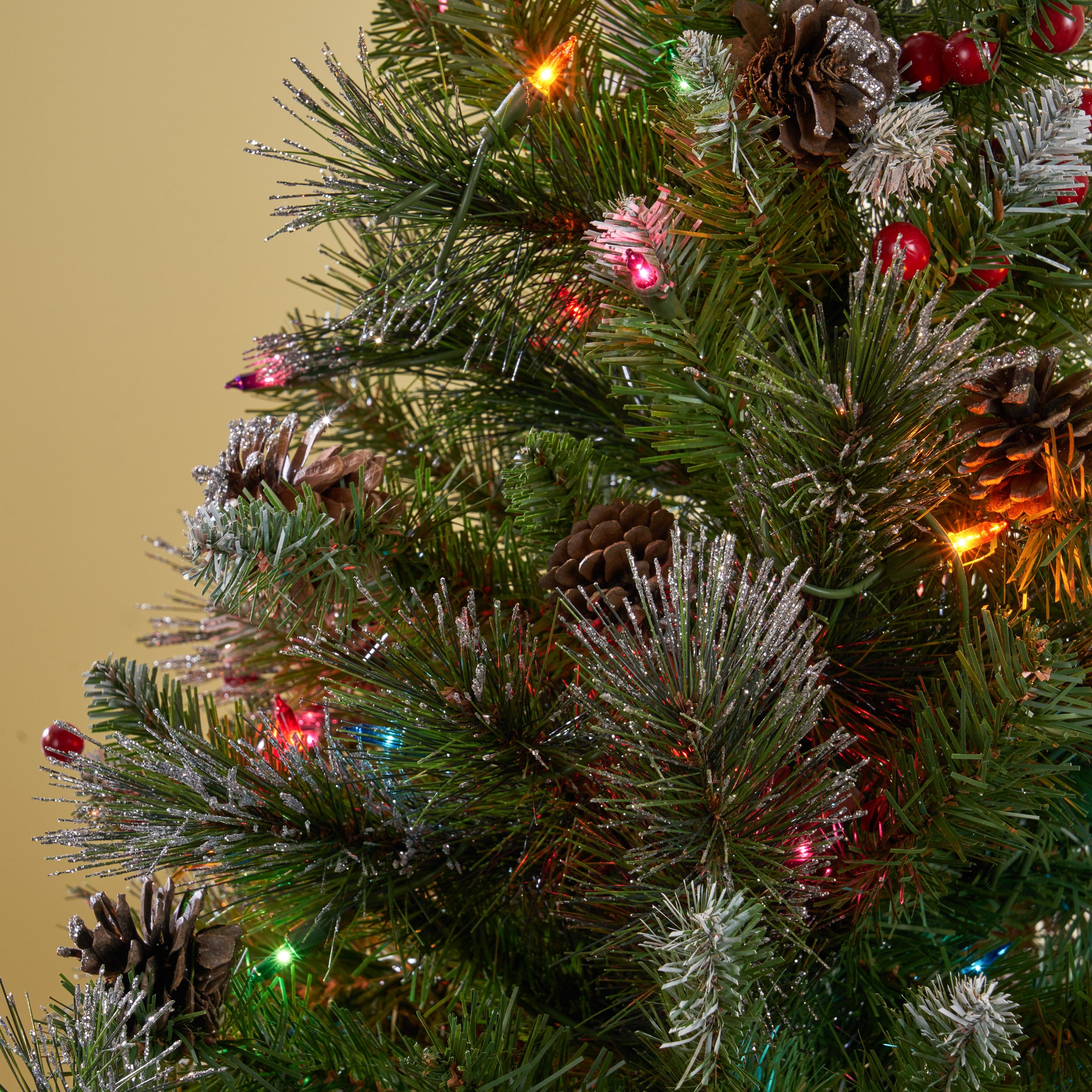 4.5-foot Mixed Spruce Hinged Artificial Christmas Tree with Glitter Branches, Red Berries, and Pinecones