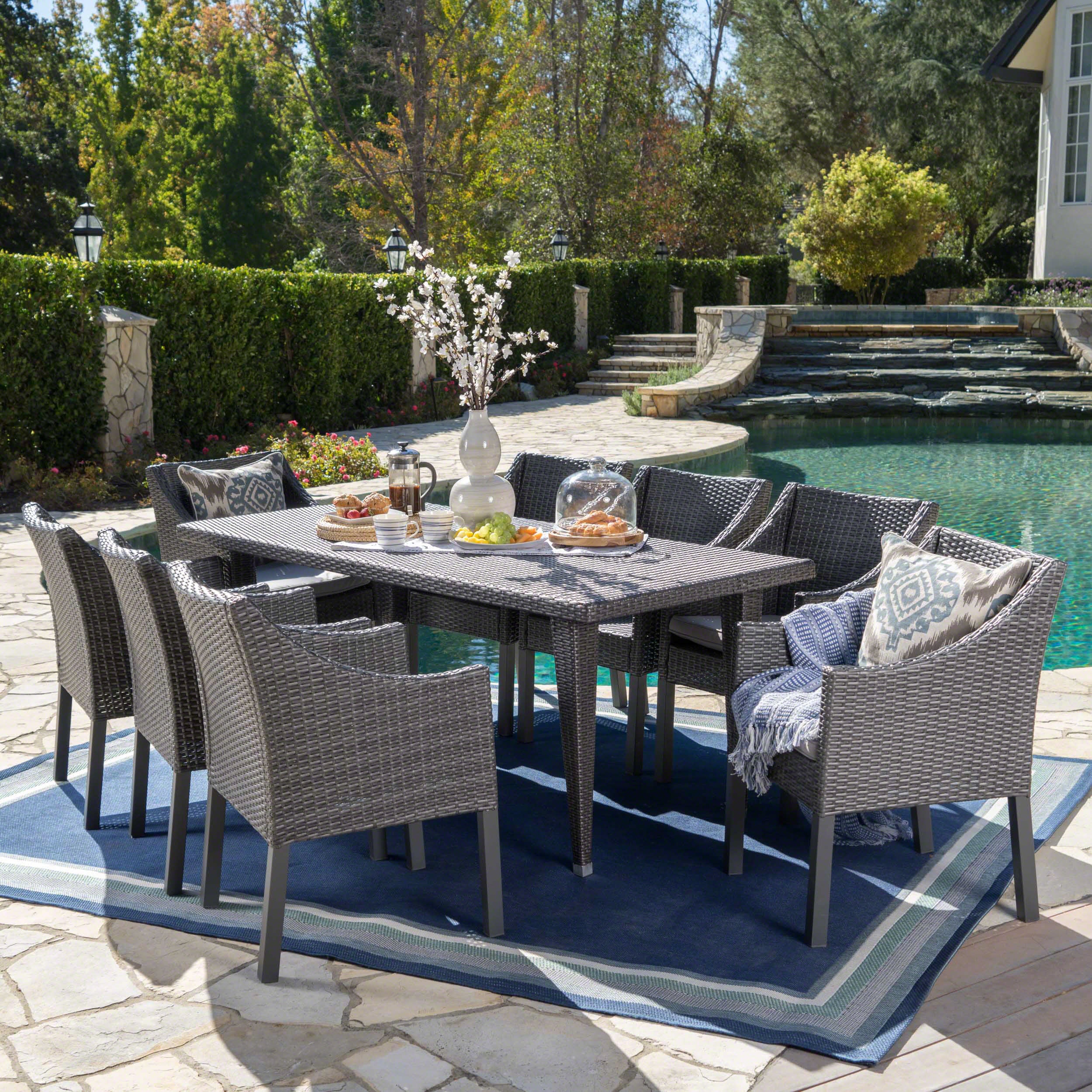 Alanna Outdoor 9 Piece Wicker Dining Set with Water Resistant Cushions