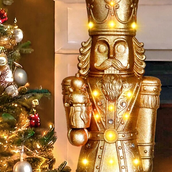 Fraser Hill Farm 4Ft. Metallic Gold Nutcracker Statue with LED Lights