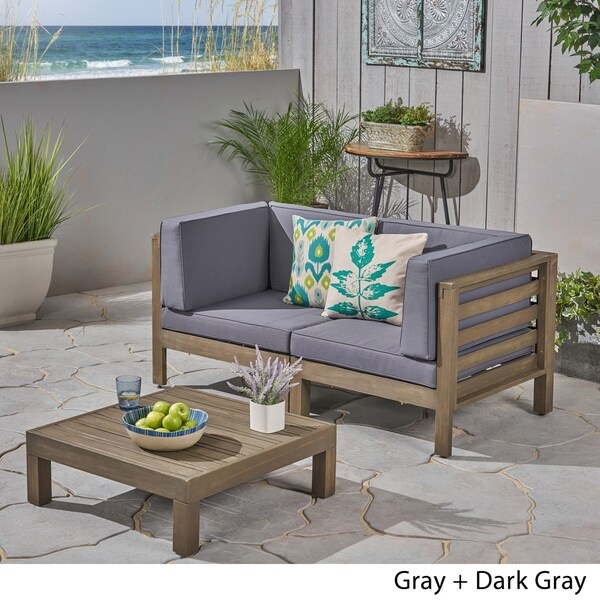 Oana Outdoor 2Seater Acacia Wood Sectional Loveseat and Coffee Table Set with Cushions by Christopher Knight Home