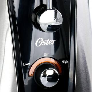 Oster 2-Speed 900-Watts Juicer Extractor with Rinse 'N Ready Filter and 32 oz. Pitcher 985120047M