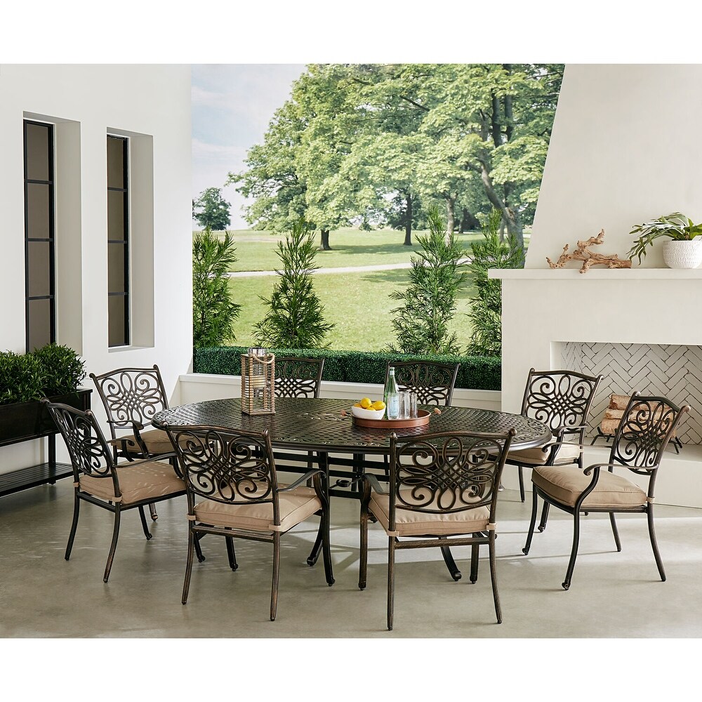 Hanover Traditions 9 Piece Dining Set in Tan with Eight Stationary Dining Chairs and 95 in. x 60 in. Oval Cast Dining Table