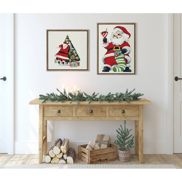 X 22 quot Sylvie Santa Claus Decorating Tree Framed Wall Canvas By Corinna Buchholz Gold Kate amp Laurel All Things Decor