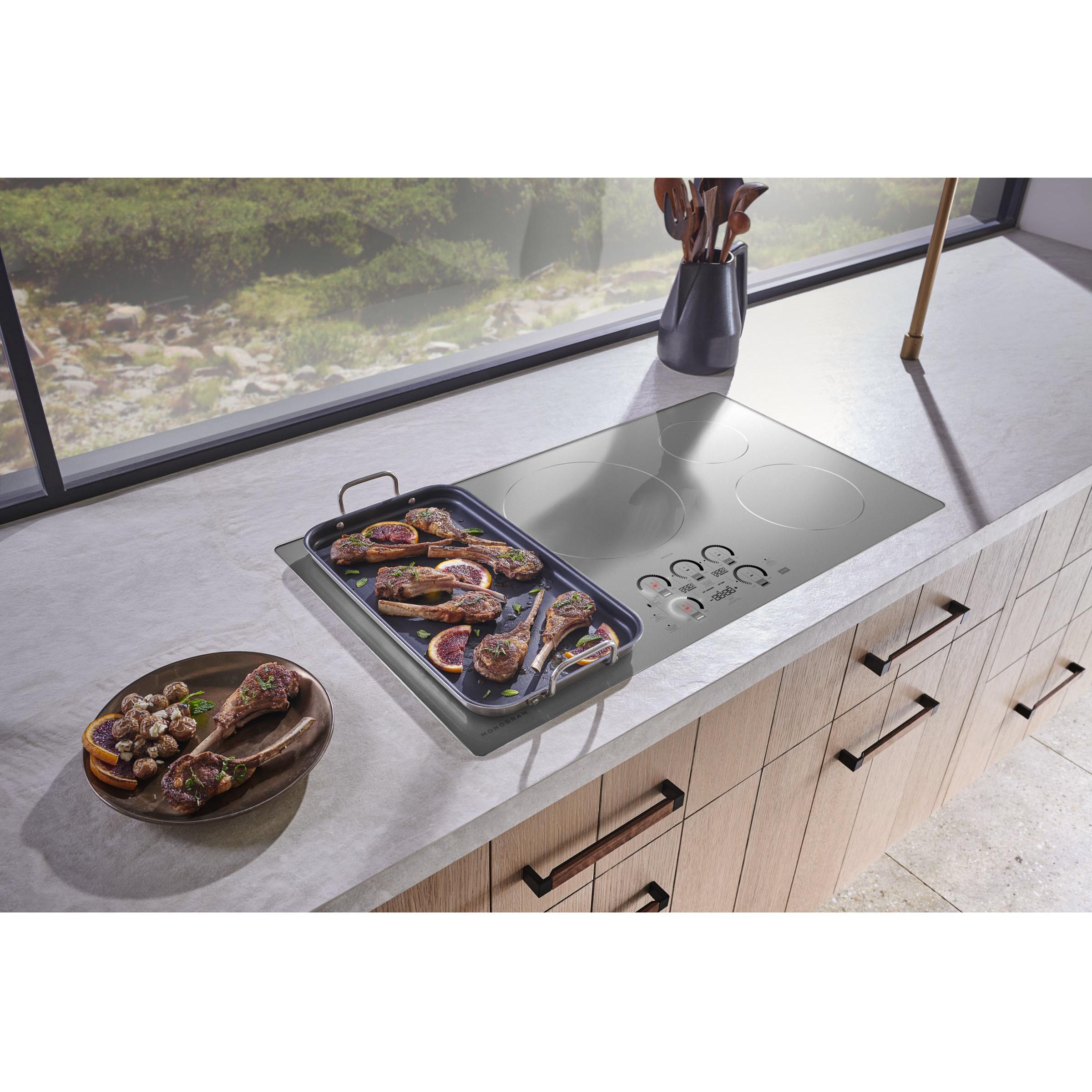 Monogram 36-inch Built-in Induction Cooktop with Wi-Fi Connect ZHU36RSTSS