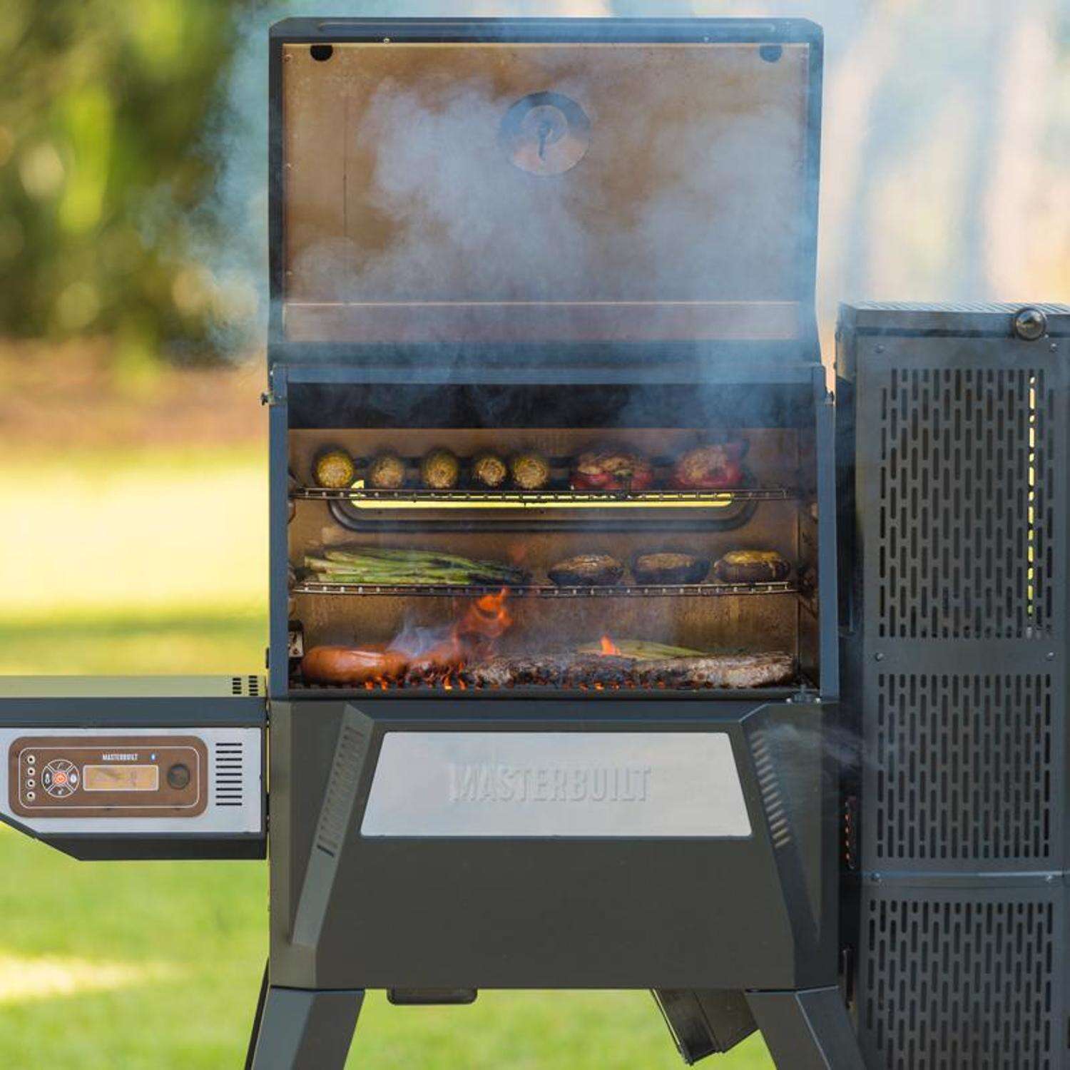 Masterbuilt 24 in. Gravity Series 560 Charcoal Grill and Smoker Black