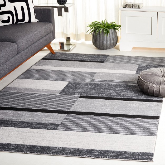 Odyssey Ody816 Power Loomed Area Rug Safavieh