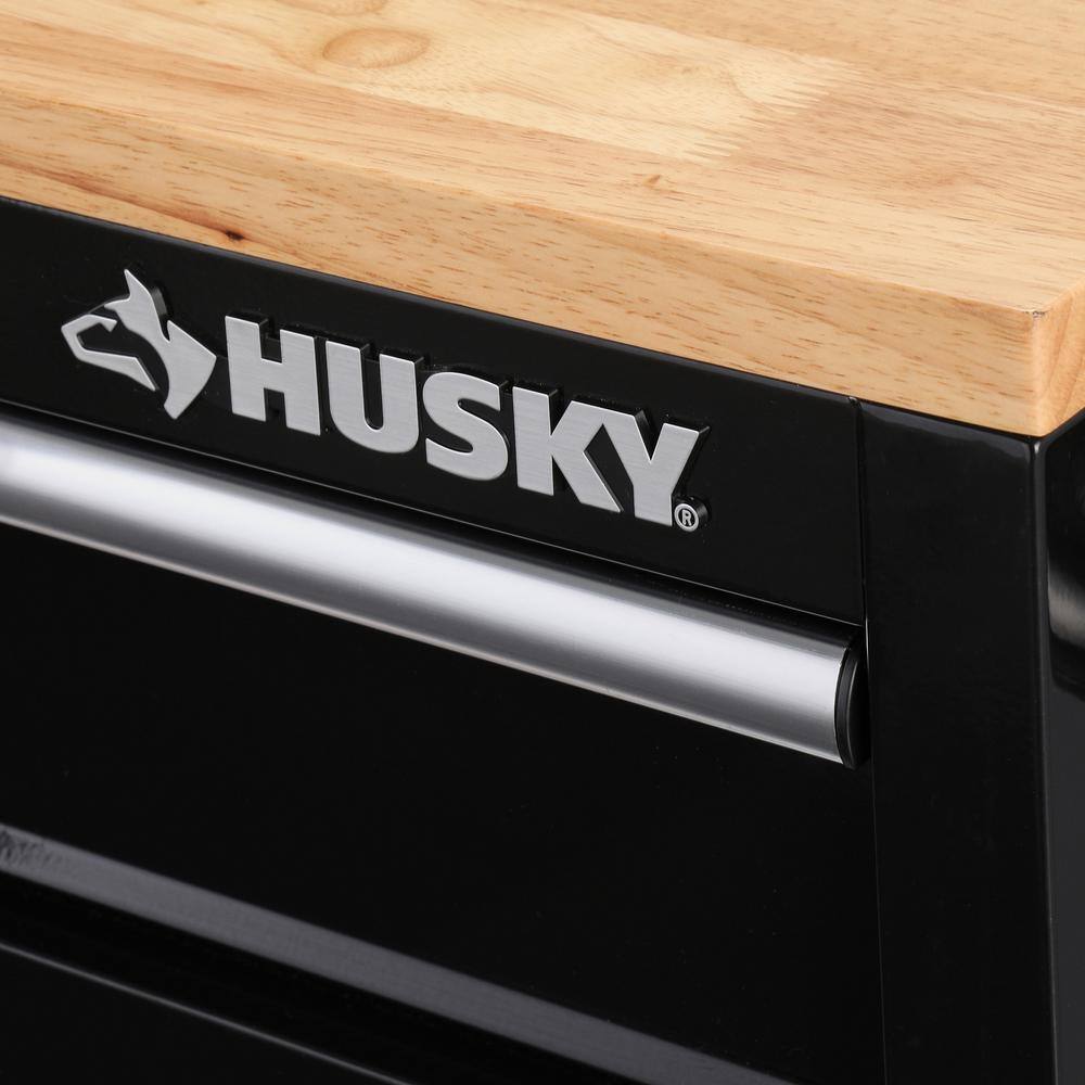 Husky 72 in. W x 24 in. D Standard Duty 18-Drawer Mobile Workbench Tool Chest with Solid Wood Top in Gloss Black HOTC7218B12M