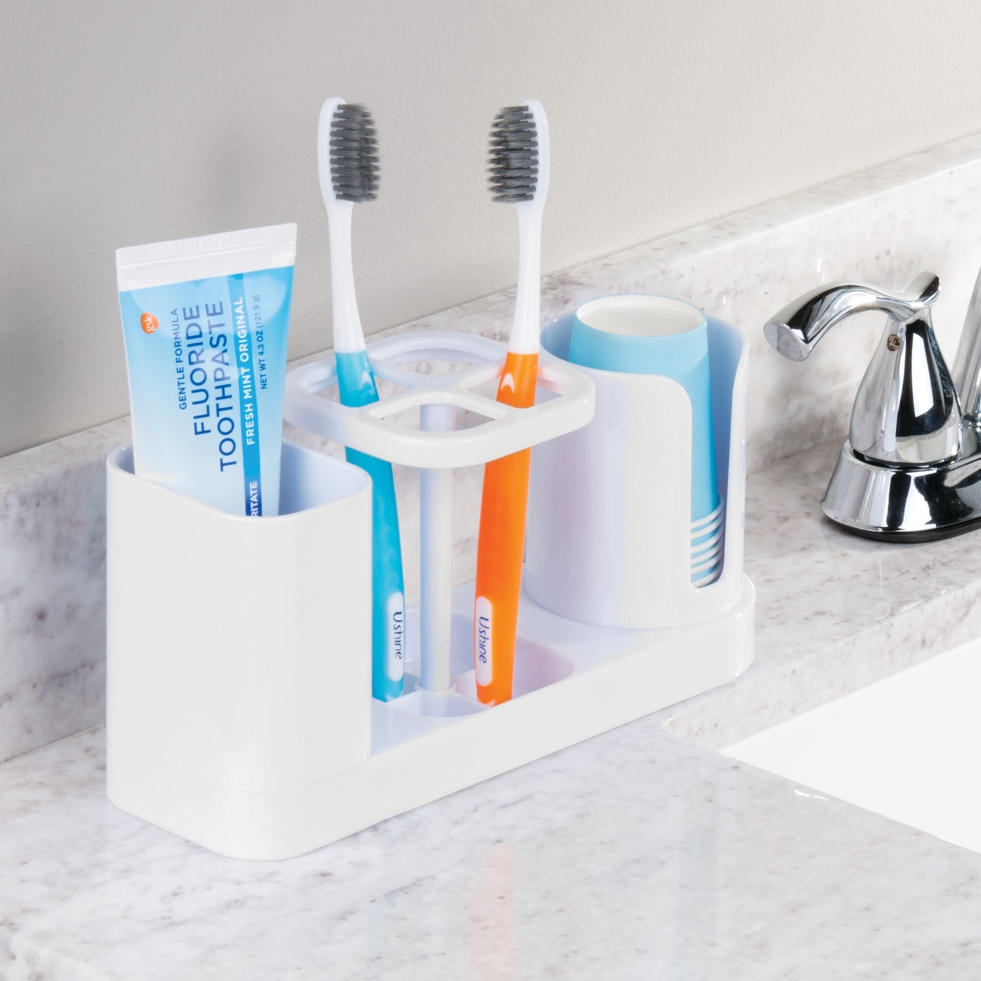 mDesign Plastic Bathroom Vanity Countertop Dental Storage Organizer Holder Stand for Electric Spin Toothbrushes/Toothpaste with Compartment for Rinse Cups - Compact Design - White