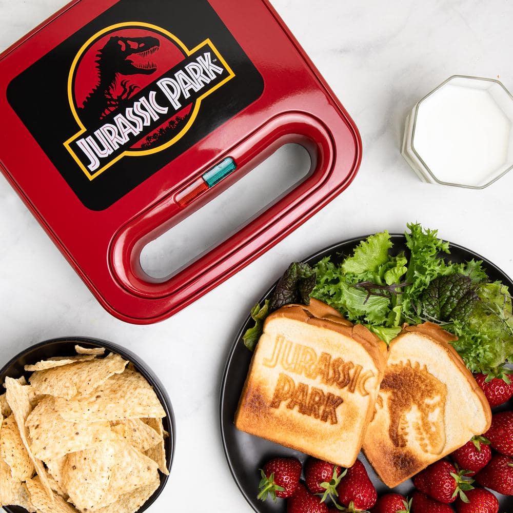 Uncanny Brands Red 900W Jurassic Park Grilled Grilled Cheese Sandwich Maker PP-JUR-JP