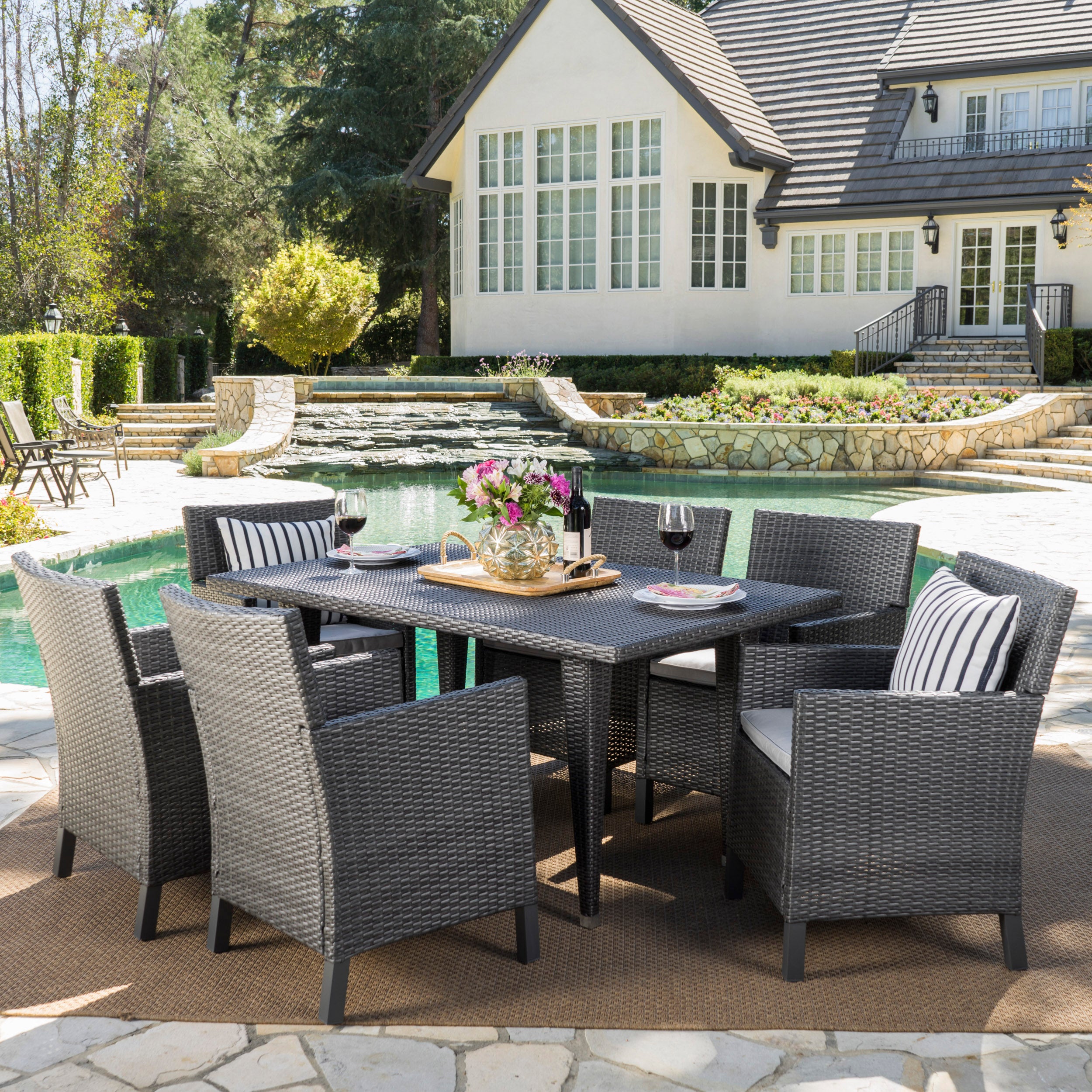 Cerrenne Outdoor 7 Piece Wicker Dining Set with Water Resistant Cushions