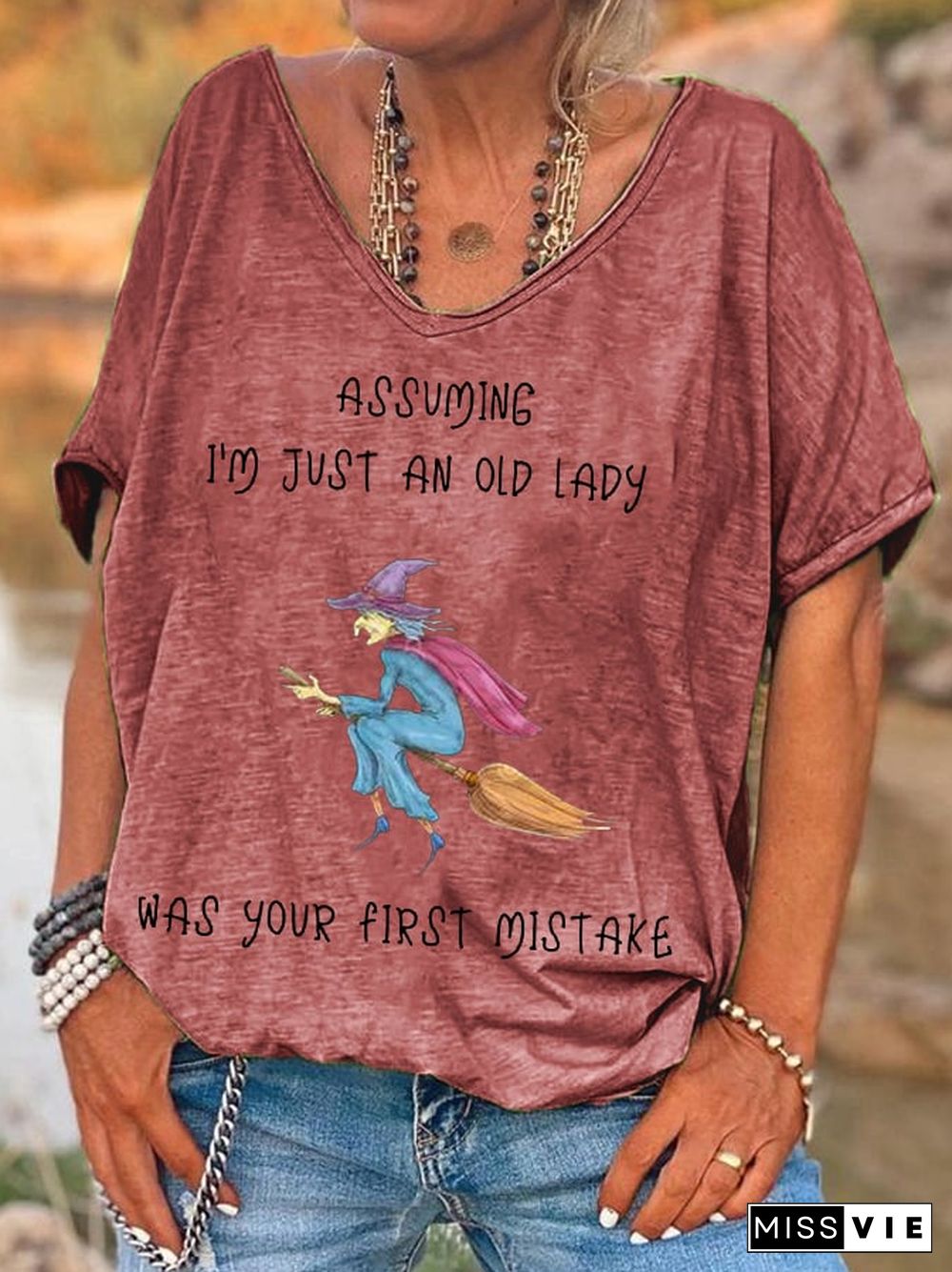 Women's Funny Witch Assuming I'm Just An Old Lady Was Your First Mistake Halloween V-Neck Tee