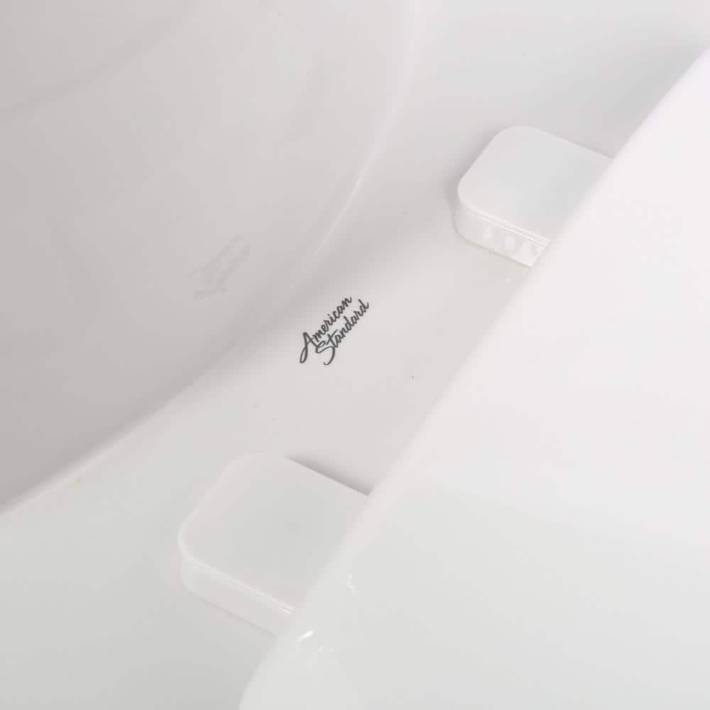 American Standard Tofino Complete 1Piece 11 GPF Dual Flush Elongated Toilet in White with Slow Close Seat