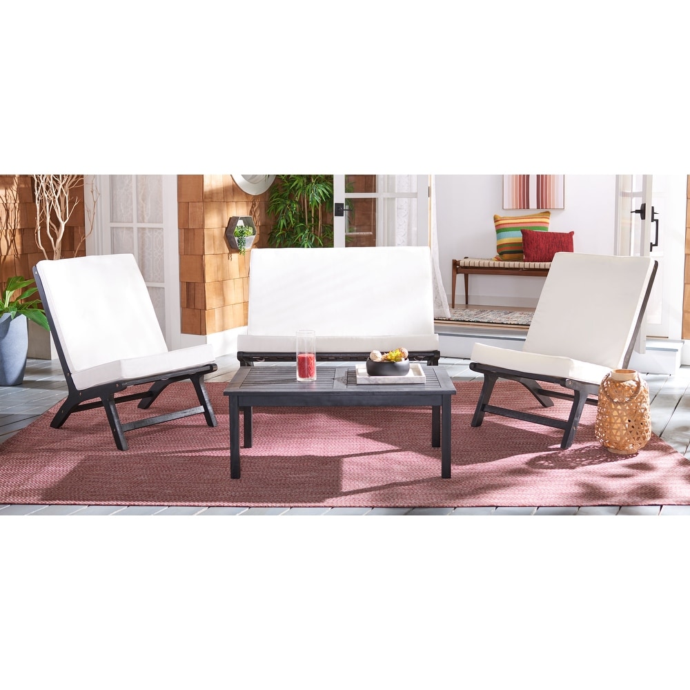 SAFAVIEH Outdoor Chaston 4 Piece Conversation Patio Set with Accent Pillows