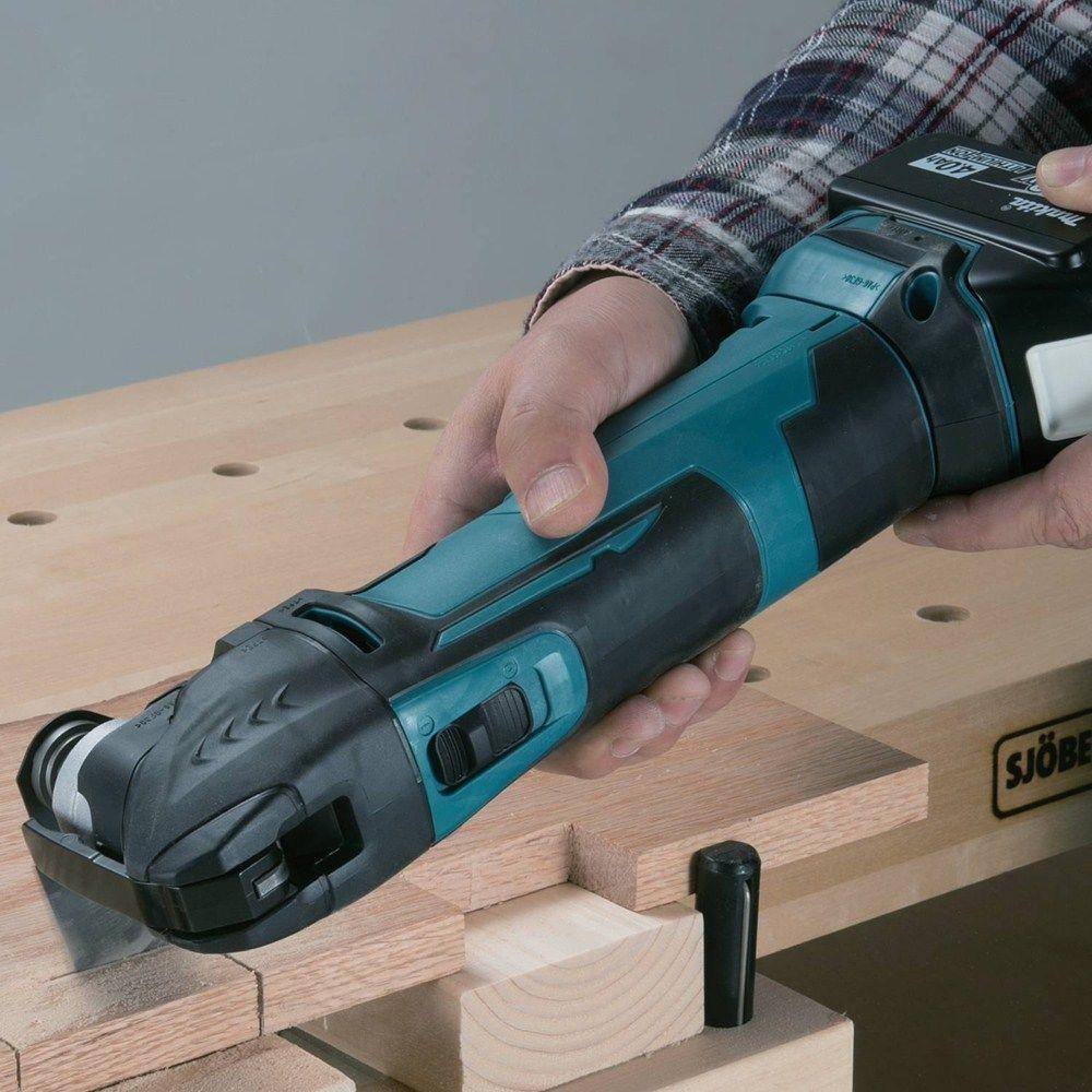 Makita 18V LXT Lithium-Ion Cordless Variable Speed Oscillating Multi-Tool (Tool-Only) With Blade and Accessory Adapters XMT03Z