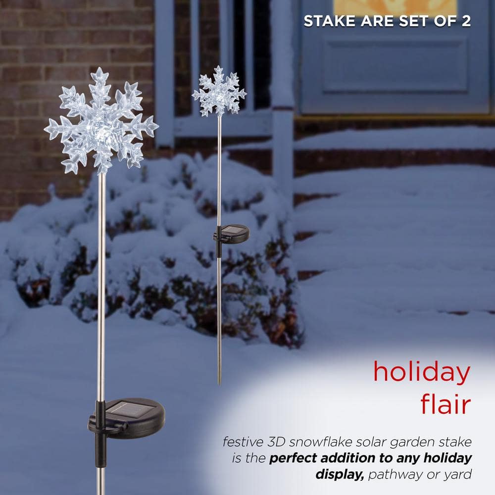 Alpine Corporation 33 in. Tall White Solar Snowflake Garden Stake with Cool LED Light (Set of 2) SLC131SLR-WT-2