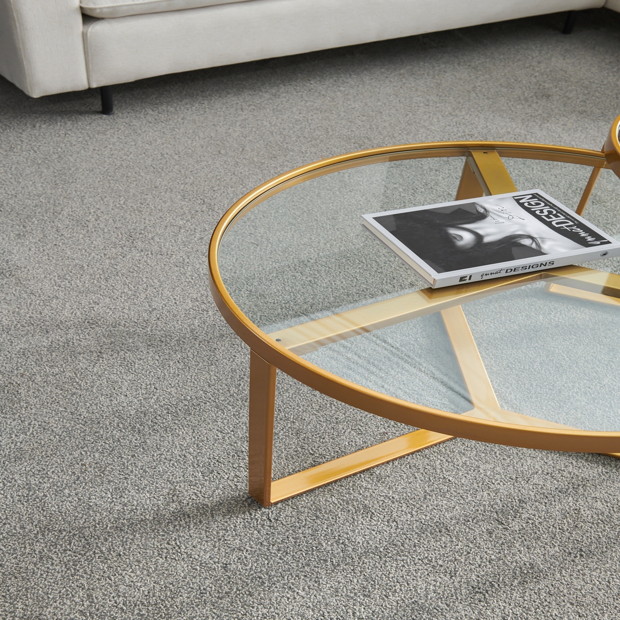 Golden metal frame with round tempered glass tabletop coffee table