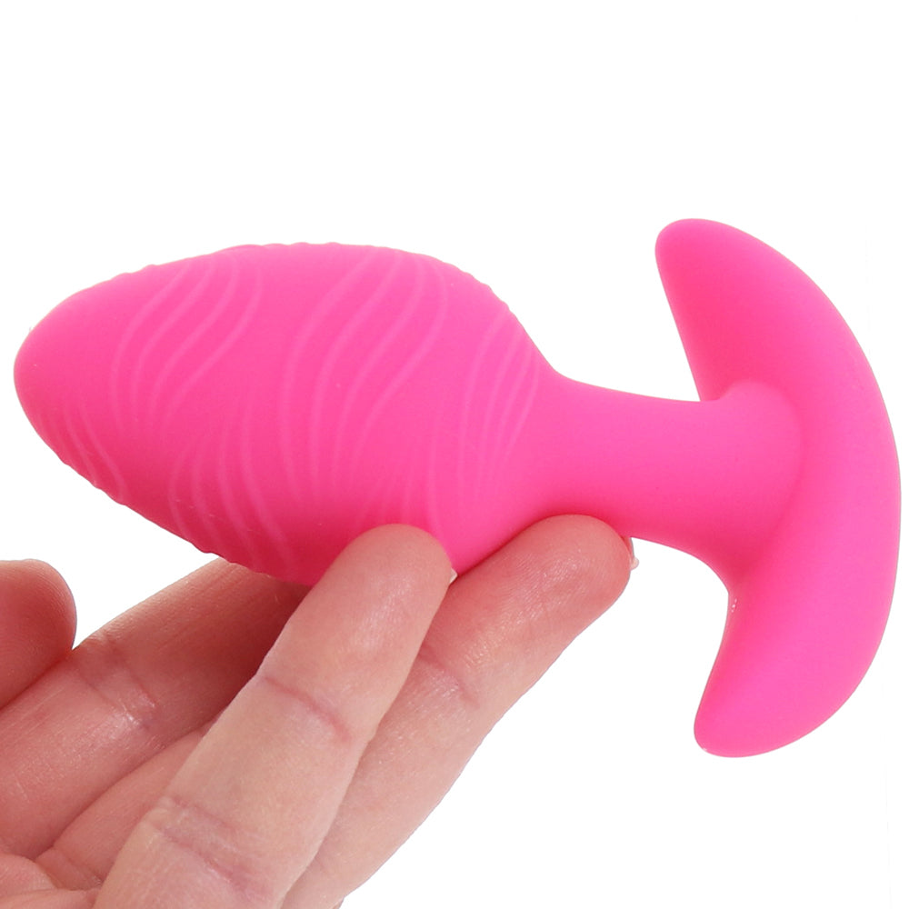 Cheeky Glow-In-The-Dark Vibrating Butt Plug in Pink