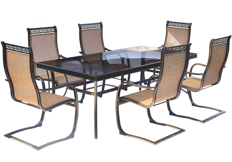 Hanover Monaco 7-Piece Outdoor Dining Set In Tan/Bronze With 6 Spring Sling Chairs， 42 x 84 Glass-Top Table