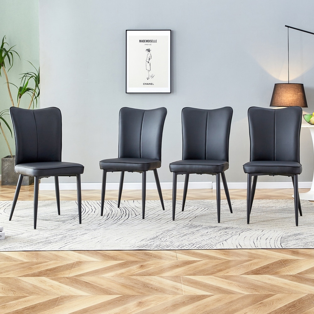 Modern dining chairs. 4 piece set of light gray PU seats with black metal legs. Suitable for restaurants  living rooms