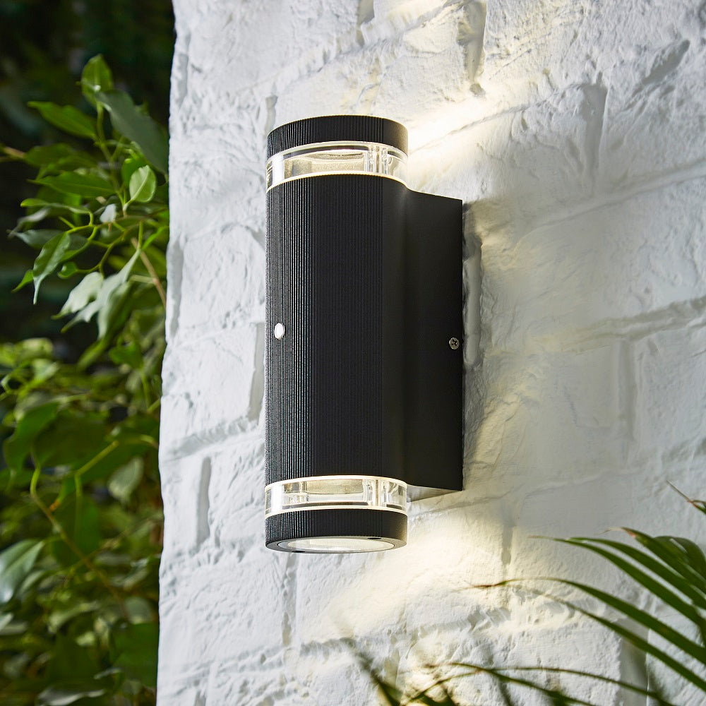 Britalia BRZN-35685-BLK Black Outdoor Modern Textured Oval Up & Down Wall Light with Photocell