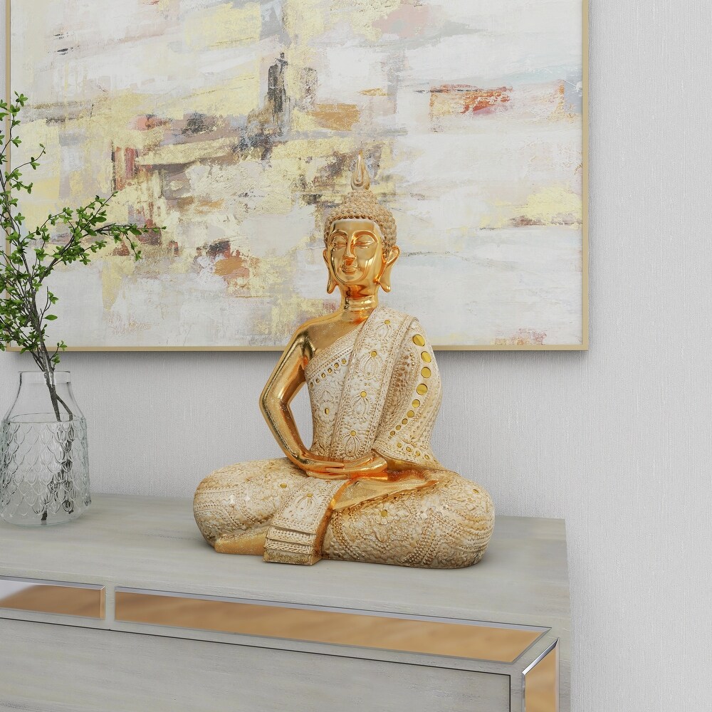 Gold Polystone Meditating Carved Buddha Sculpture with Intricate Carvings and Mirrored Embellishments   14 x 9 x 20