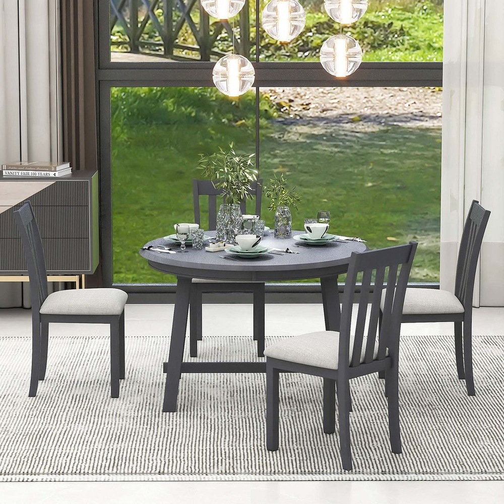 Expandable round dining table set for 4