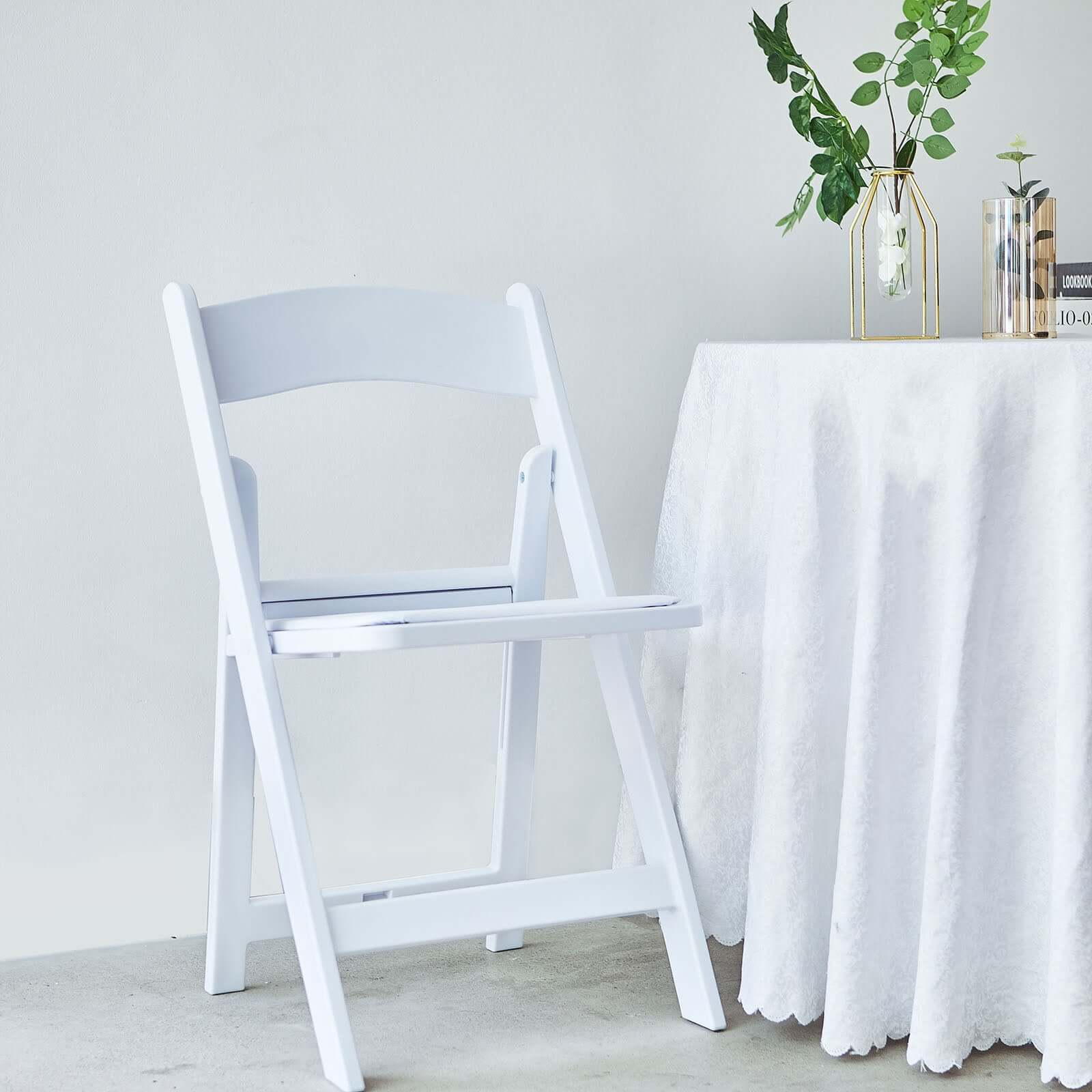 White Resin Folding Chair With Vinyl Padded Seat For Weddings, Indoor or Outdoor Events