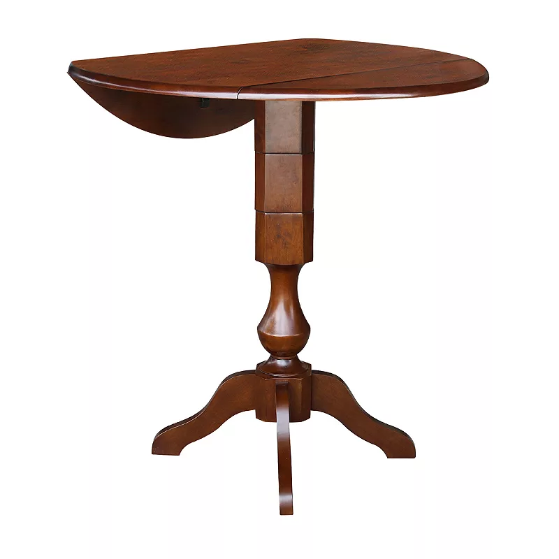 International Concepts Round Dual Drop Leaf Pedestal Dining Table