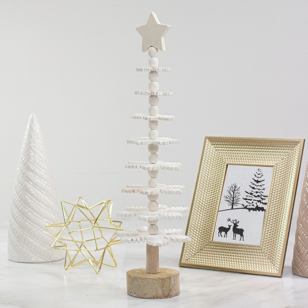 White Wooden Snowflake Cutout Christmas Tree With A Star Table Top Decor