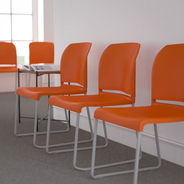 HERCULES Series 880 lb. Capacity Orange Full Back Contoured Stack Chair with Gray Powder Coated Sled Base