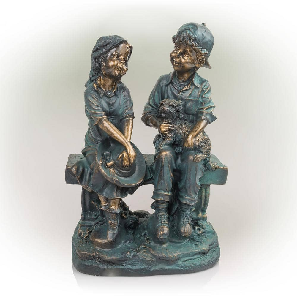 Alpine Corporation 16 in. Tall Indoor/Outdoor Girl and Boy Sitting on Bench with Puppy Statue Yard Art Decoration GXT264