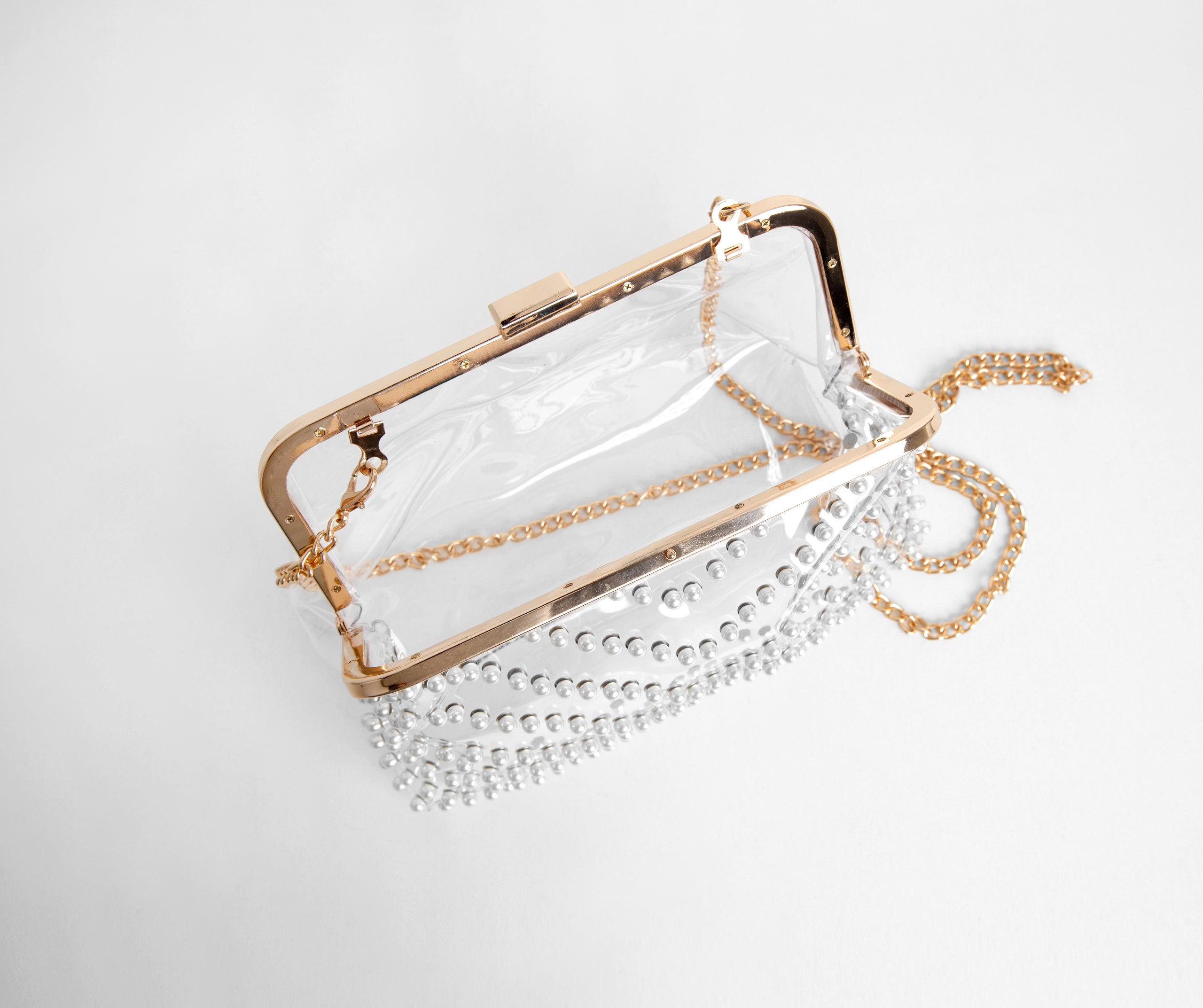 Give A Twirl Clear Pearl Clutch