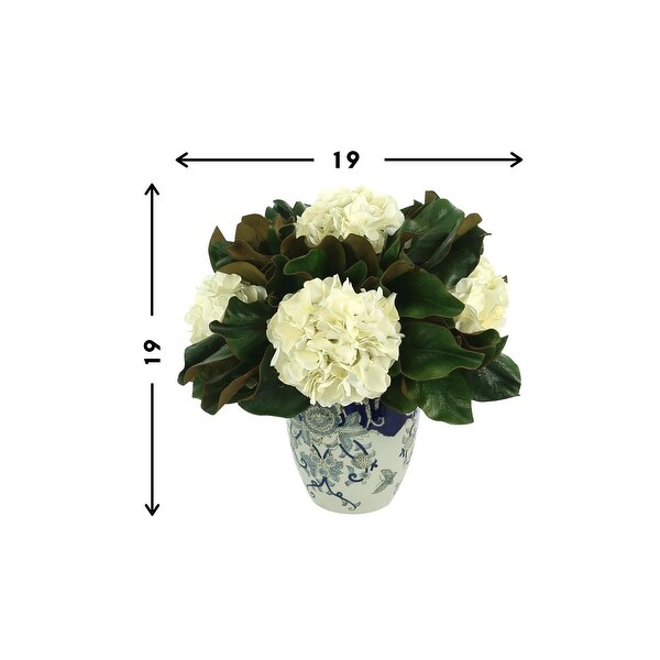 Hydrangea and Magnolia Leaf Arrangement in a Decorative Vase