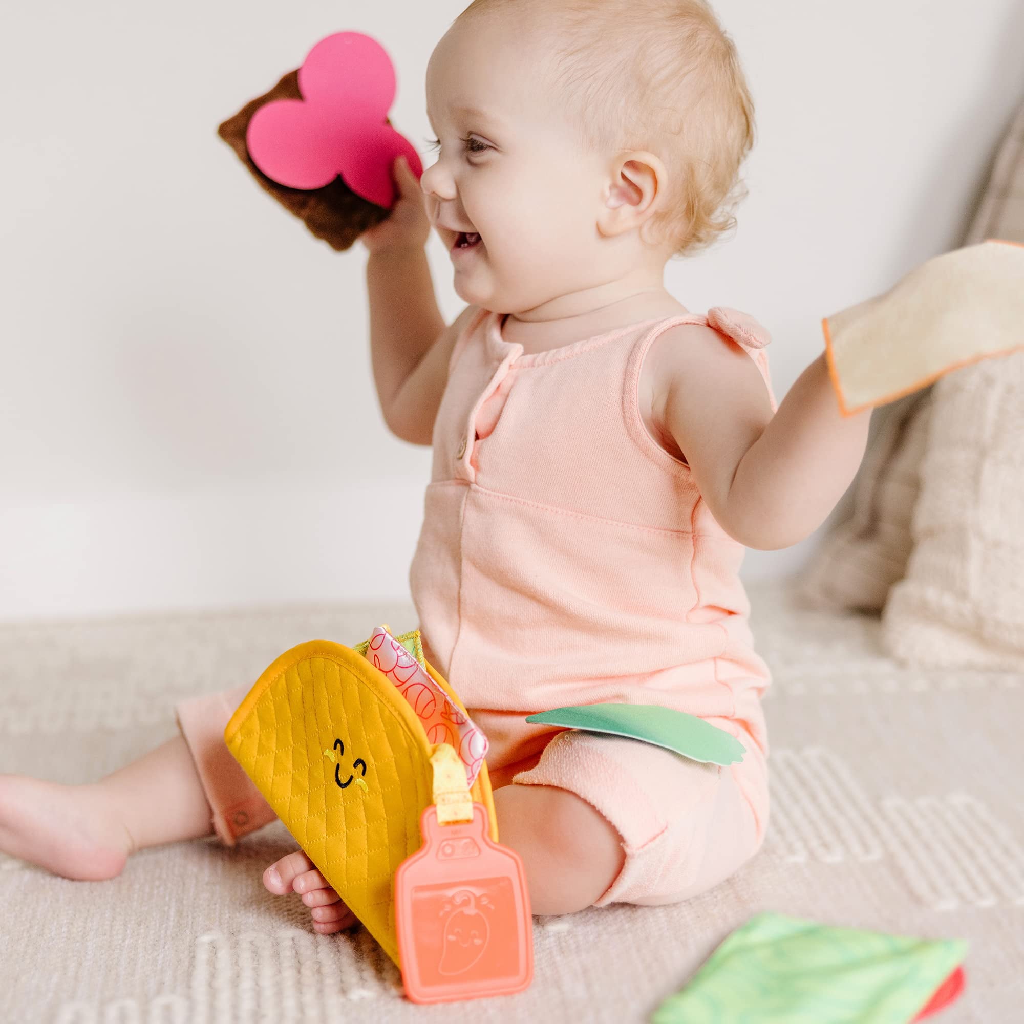 Melissa and Doug Multi-Sensory Soft Taco Fill and Spill Infant Toy