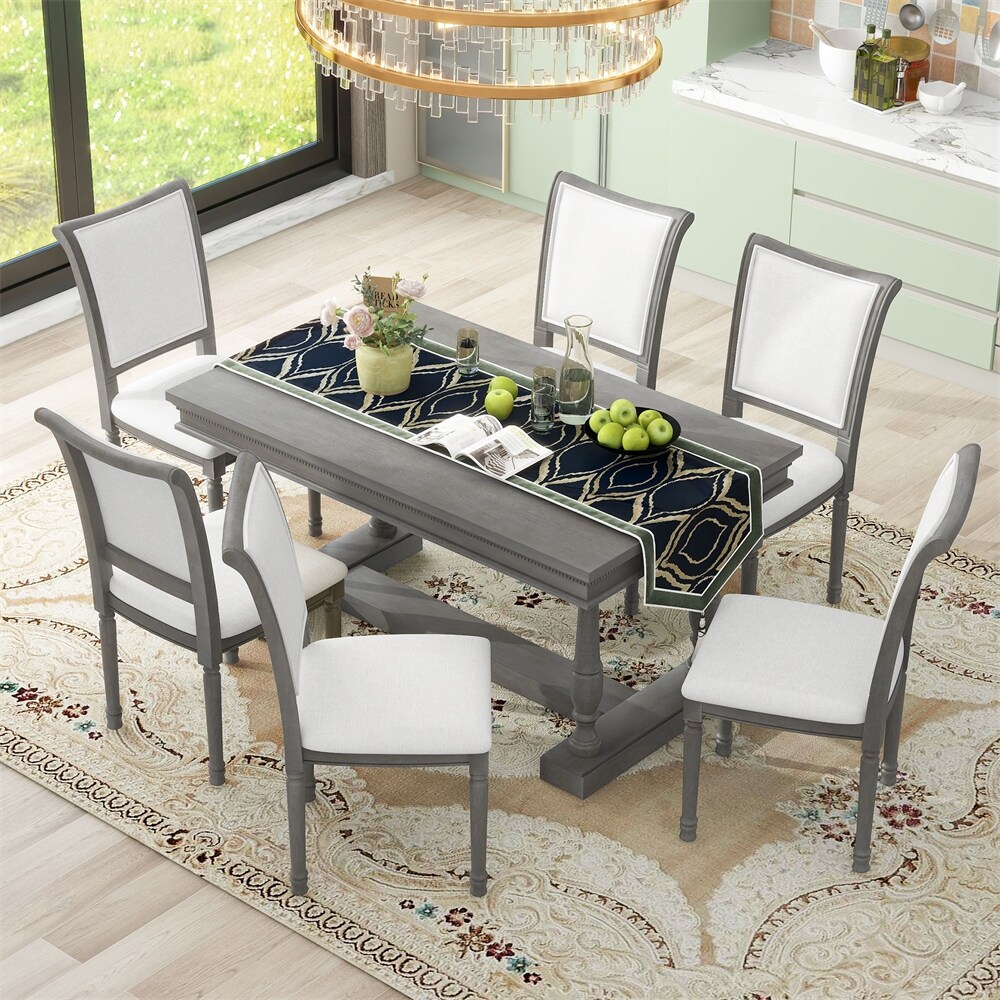 7 Piece Dining Table with 4 Trestle Base and 6 Upholstered Chairs