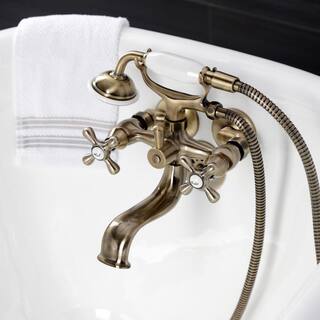 Kingston Brass Kingston 2-Handle Wall-Mount Clawfoot Tub Faucets with Handshower in Antique Brass HKS225AB