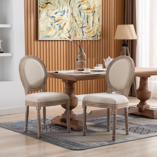 Upholstered Fabrice French Dining Chair with rubber legs