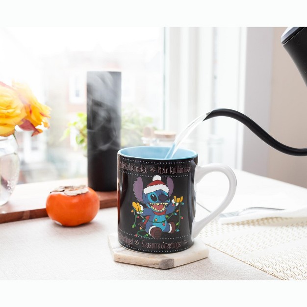 Silver Buffalo Disney Lilo amp Stitch Holiday Sweater Heat reveal Ceramic Mug Holds 14 Ounces