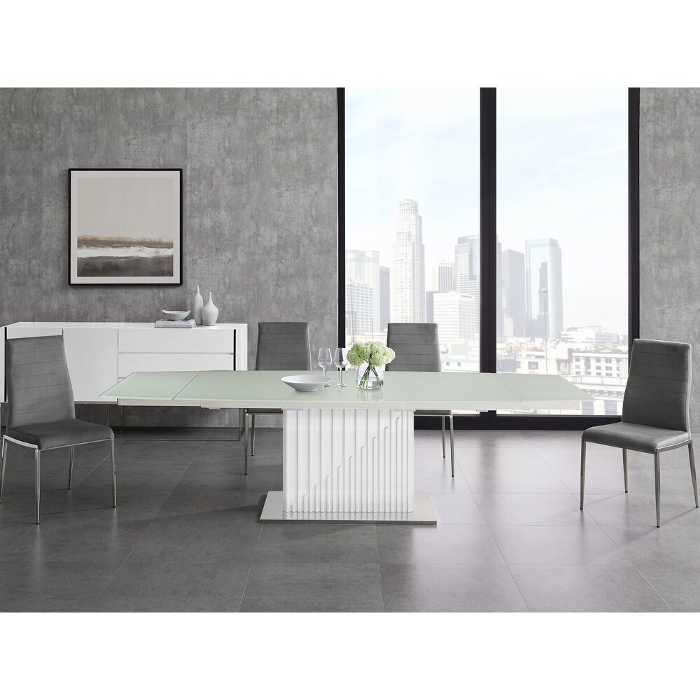 MOON dining table with high gloss white lacquer base.