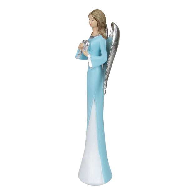 Blue And White Angel Figure Holding A Heart